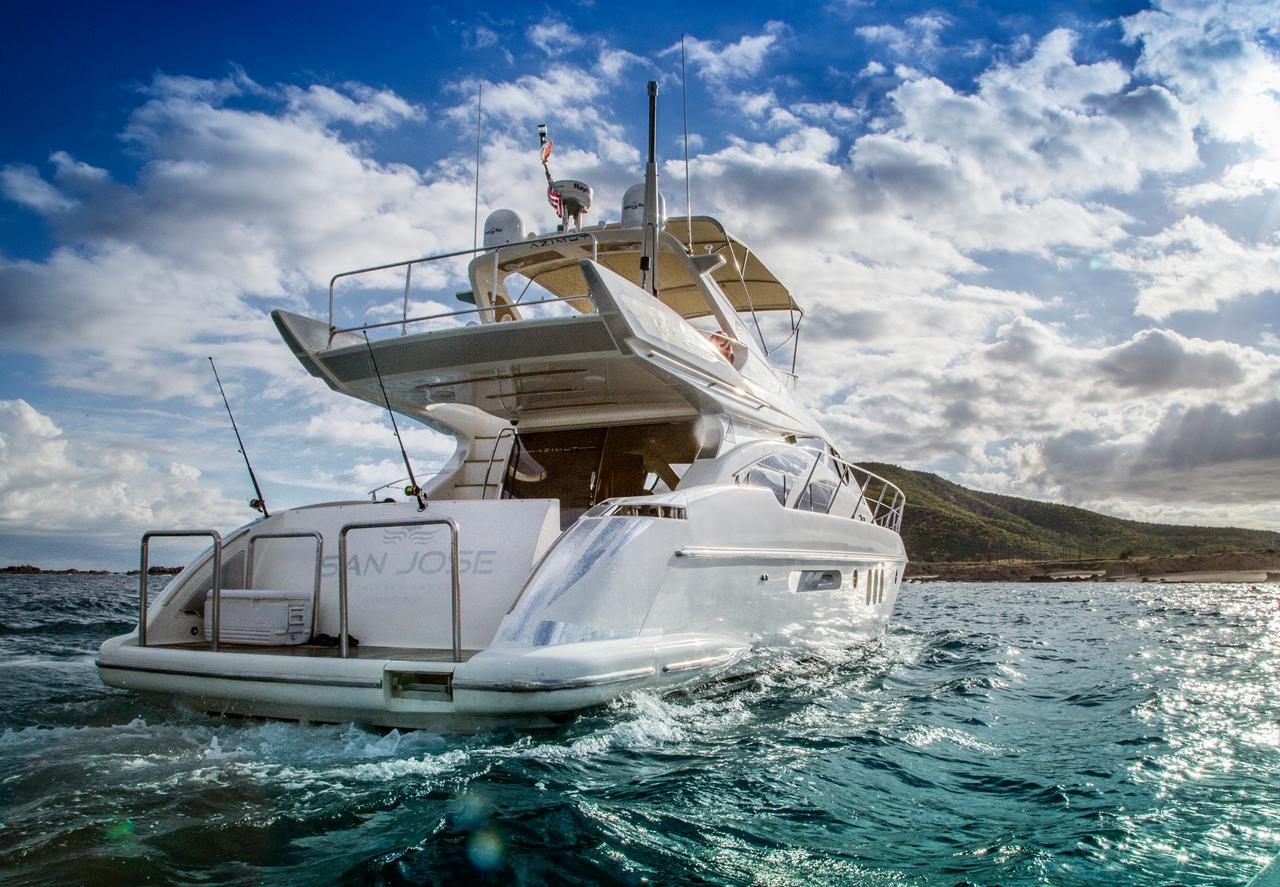 A flybridge motor yacht under way off Cabo San Lucas