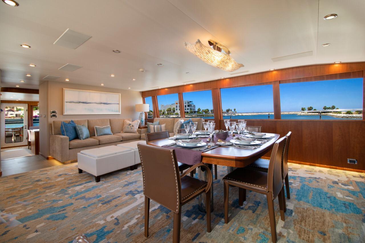 A spacious, light-filled salon inside a luxury motor yacht
