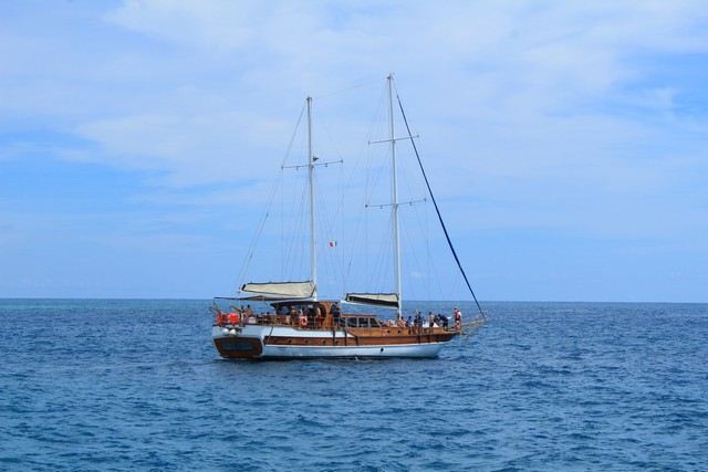 A large sailing yacht suited to group charters, under sail